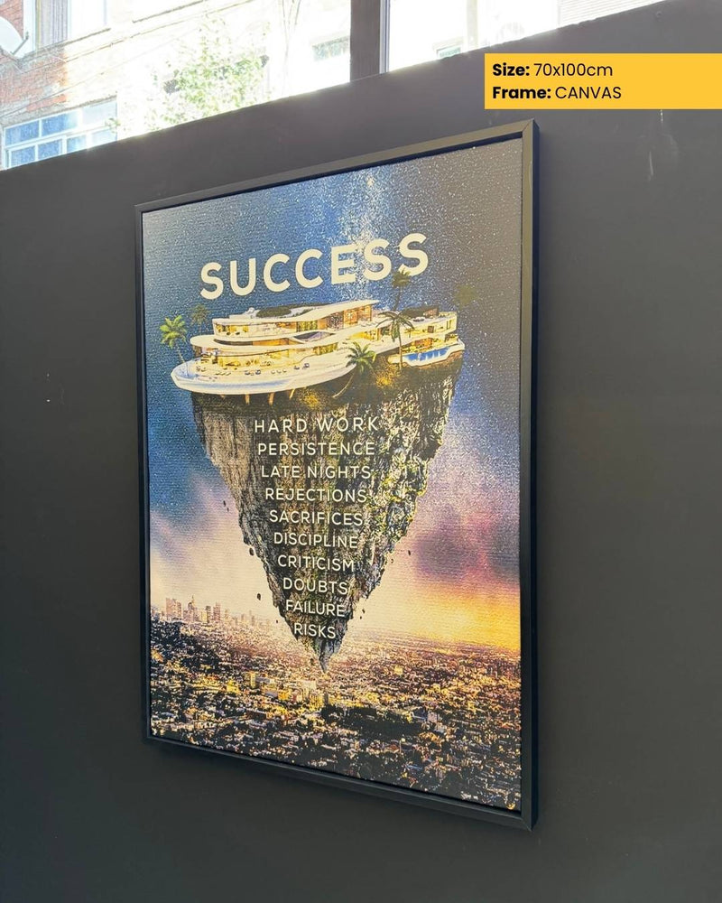 Framed artwork with 'SUCCESS' and motivational words on a cityscape background.