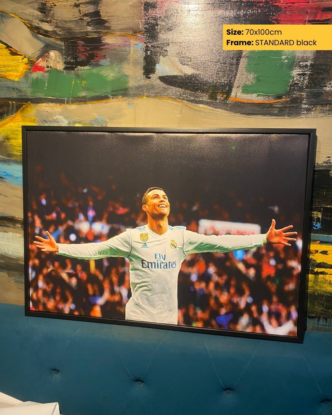 Framed picture of a soccer player with a colorful background