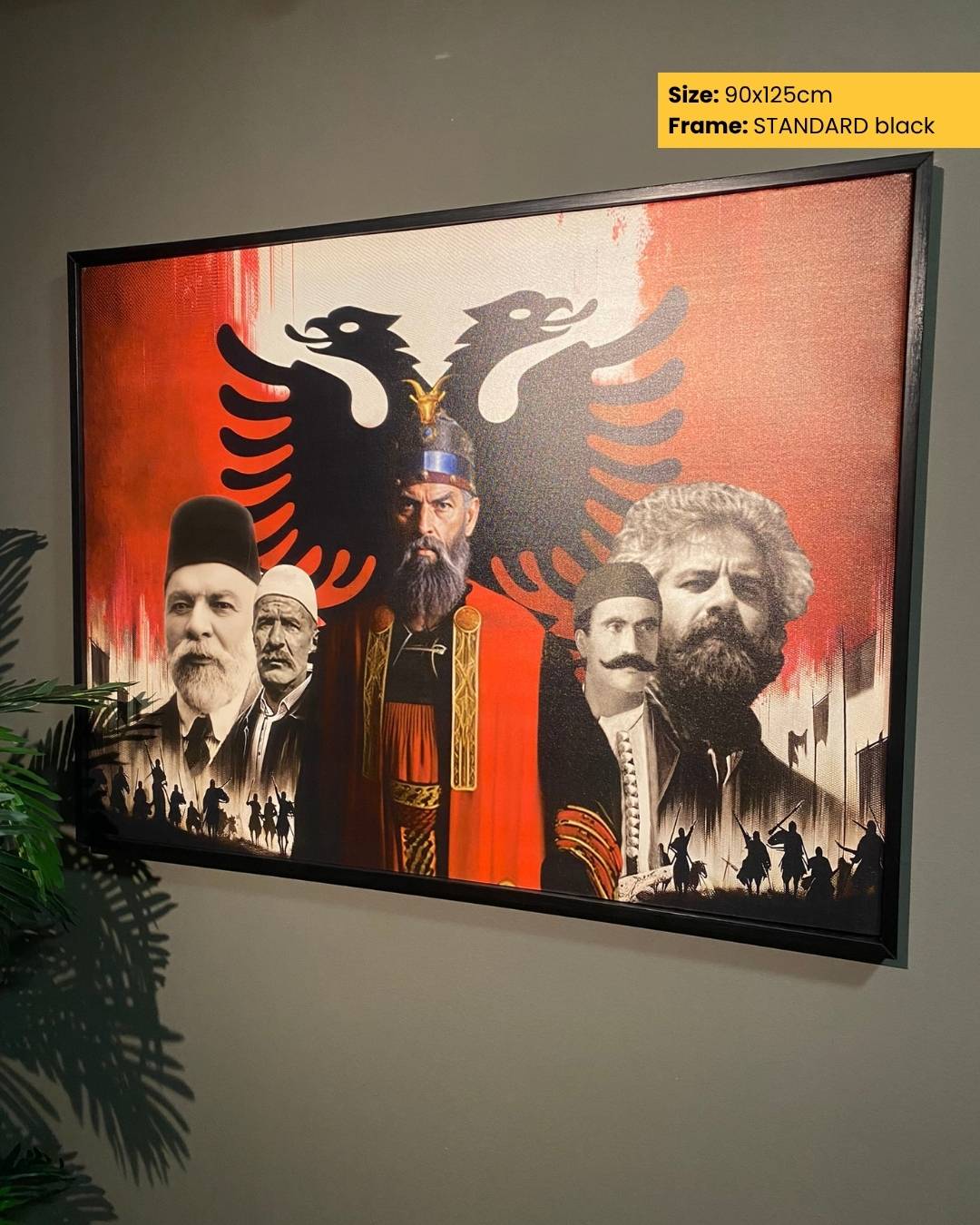 Framed artwork with historical figures and an eagle emblem on a red background.