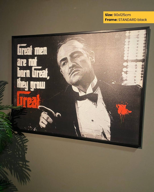 Framed poster of a man in a tuxedo with text on a wall.