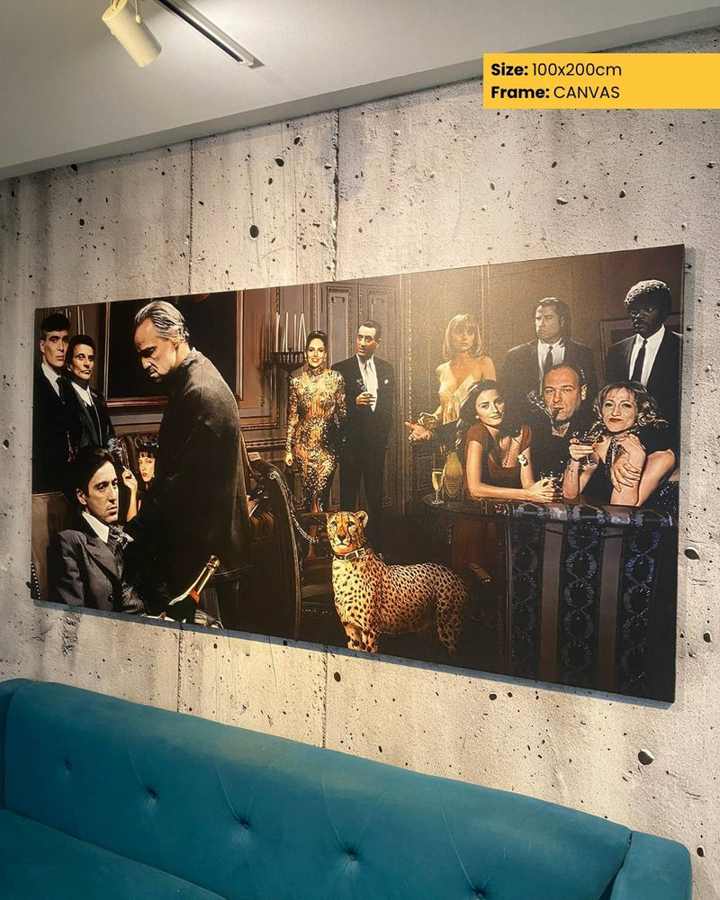 Large canvas print of a group of people in formal attire with a leopard, mounted on a textured wall above a blue sofa.