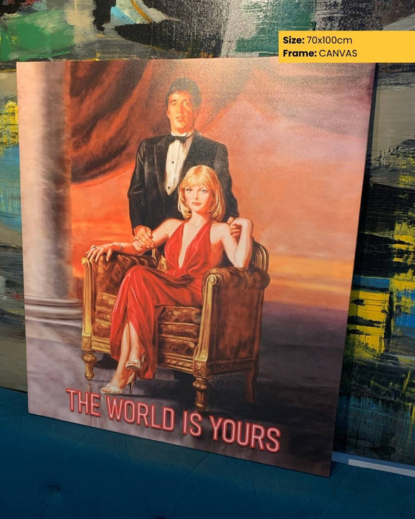 Canvas print of a couple in formal attire with 'The World is Yours' text, displayed against a colorful background.