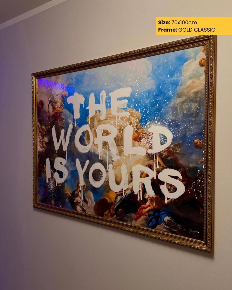 Framed artwork with 'The World is Yours' text on a wall.