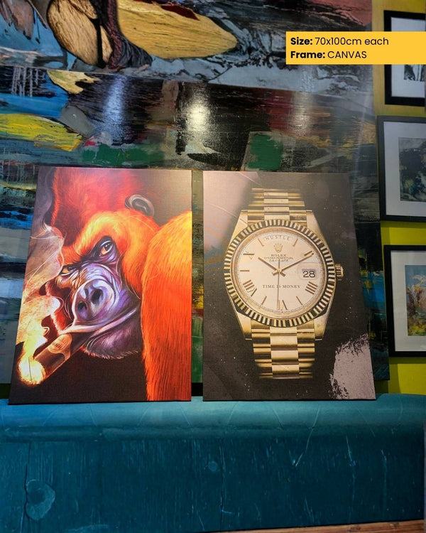 Two canvas prints of a gorilla and a gold watch on a table with a colorful background.
