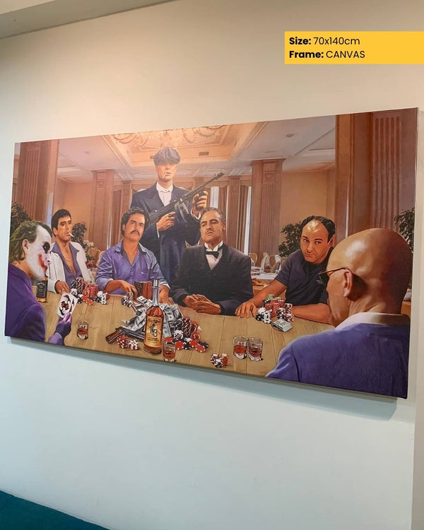 Canvas print of a group of men around a table with drinks, on a white wall.