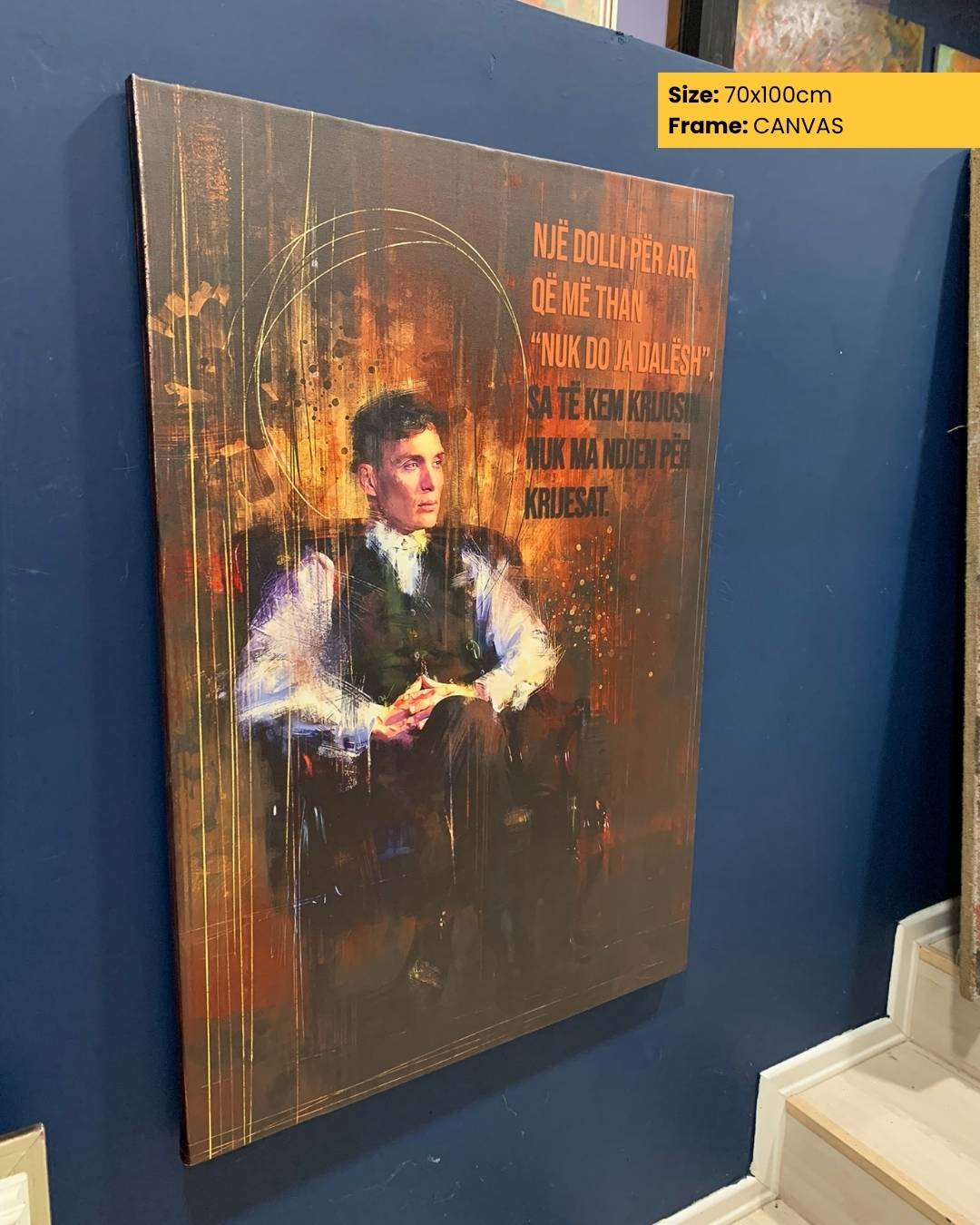 Canvas print of a man in formal attire on a blue wall