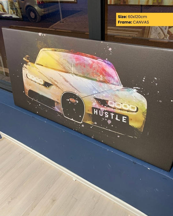 Canvas print of a car with 'HUSTLE' text on a table