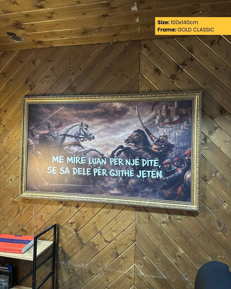 Framed artwork with a warrior scene on a wooden wall.