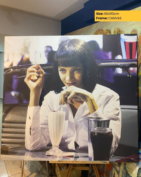 Woman sitting in a car with a drink, framed as a canvas print.