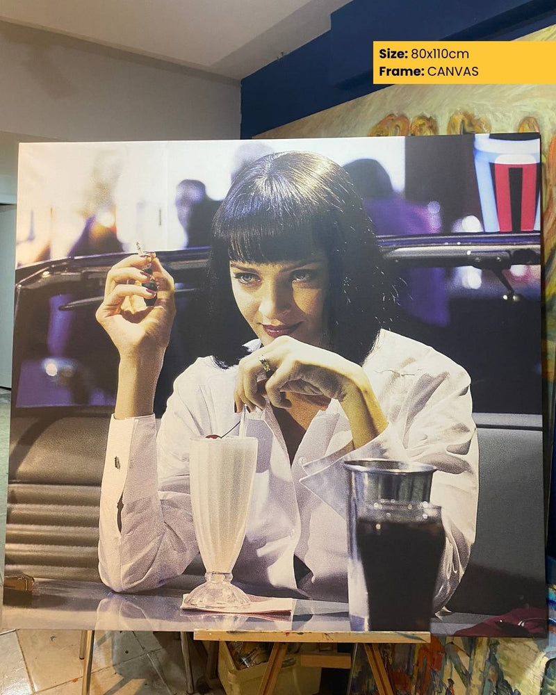 Woman sitting in a car with a drink, framed as a canvas print.