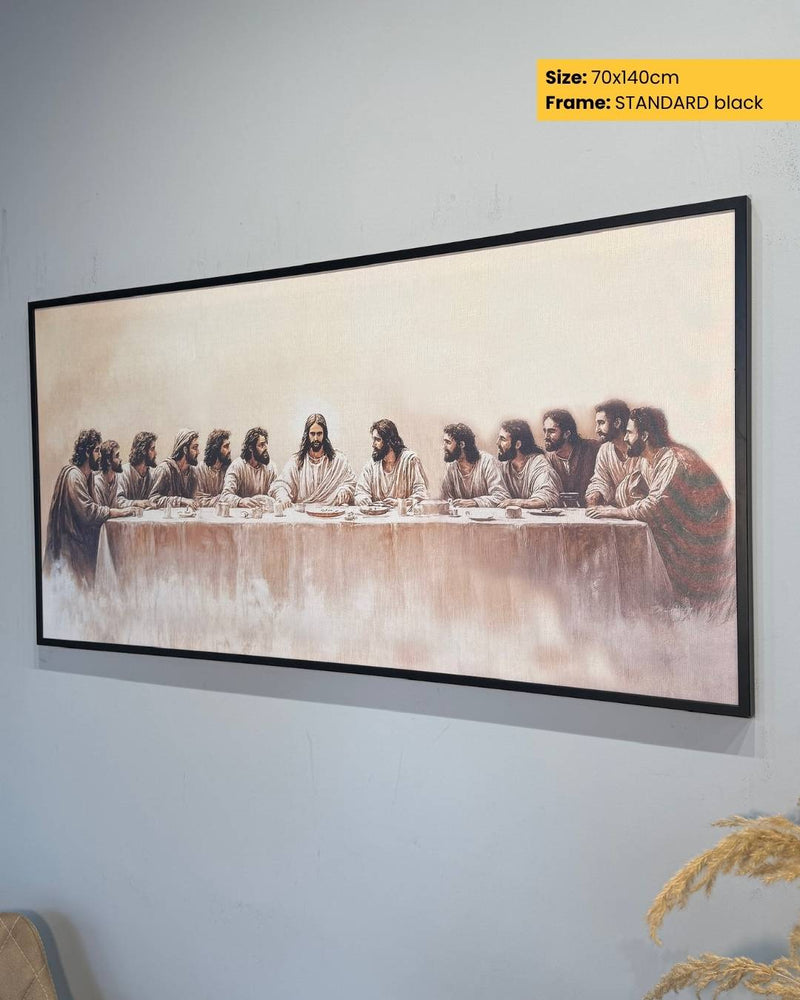 Framed artwork of 'The Last Supper' on a wall.