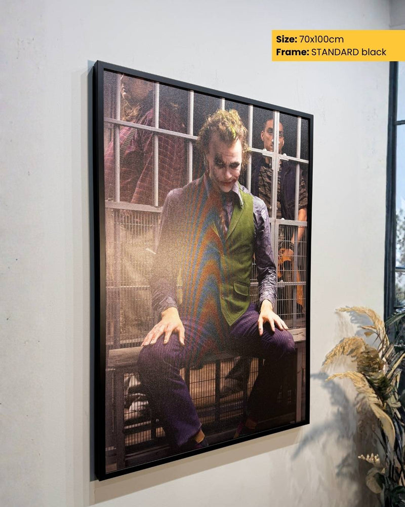 Framed artwork of a character in a colorful outfit sitting on a window ledge.