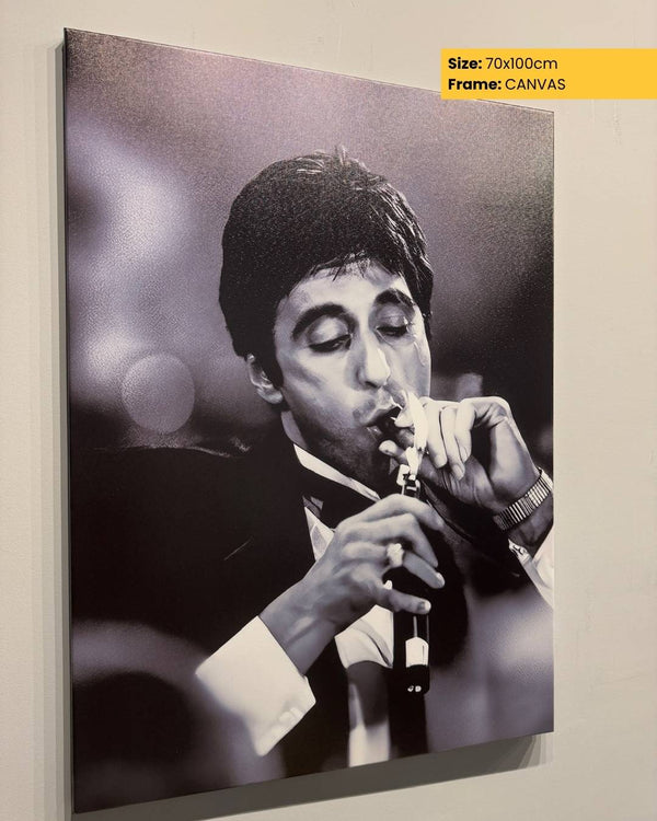 Black and white portrait of a man playing a clarinet on a canvas print with size and frame information.