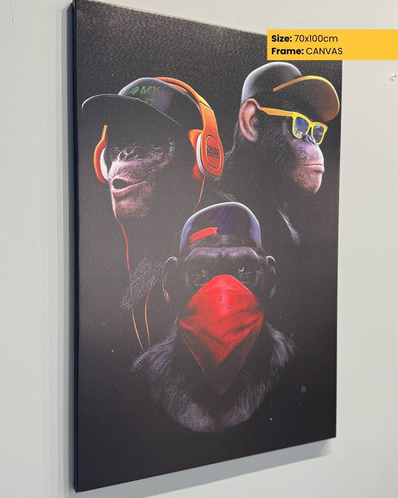 Canvas print of three chimpanzees wearing headphones and a mask, framed by a yellow border with text.