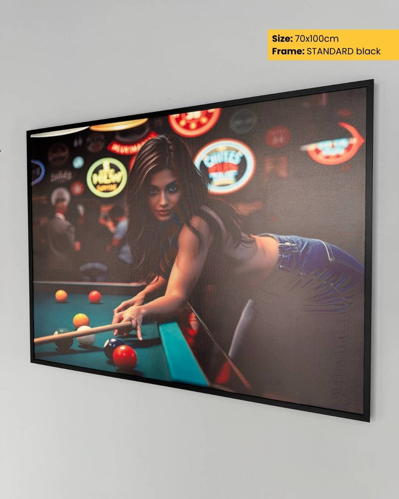 Framed artwork of a woman playing pool with neon signs in the background