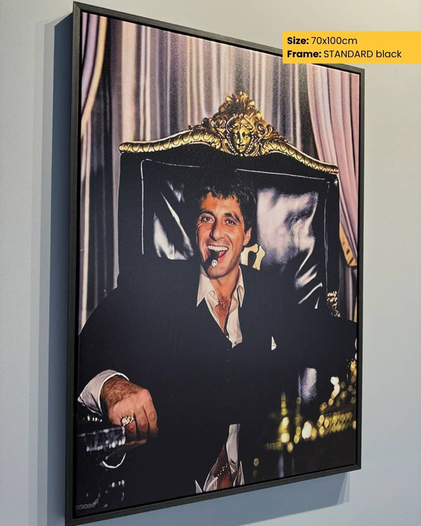 Framed artwork of a person with a decorative headboard on a wall.