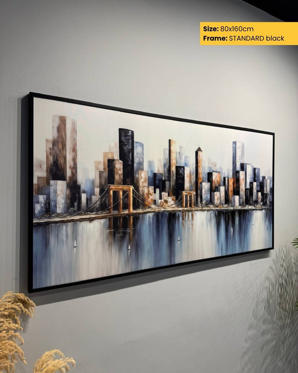 Framed cityscape painting on a wall with dimensions and frame color displayed.