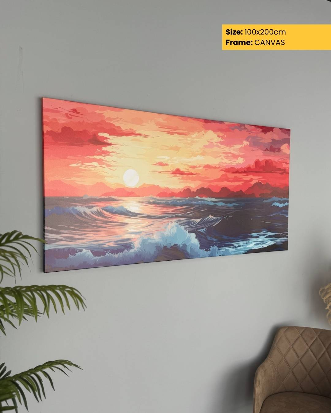 Canvas print of a sunset over water with a plant and chair in the foreground.