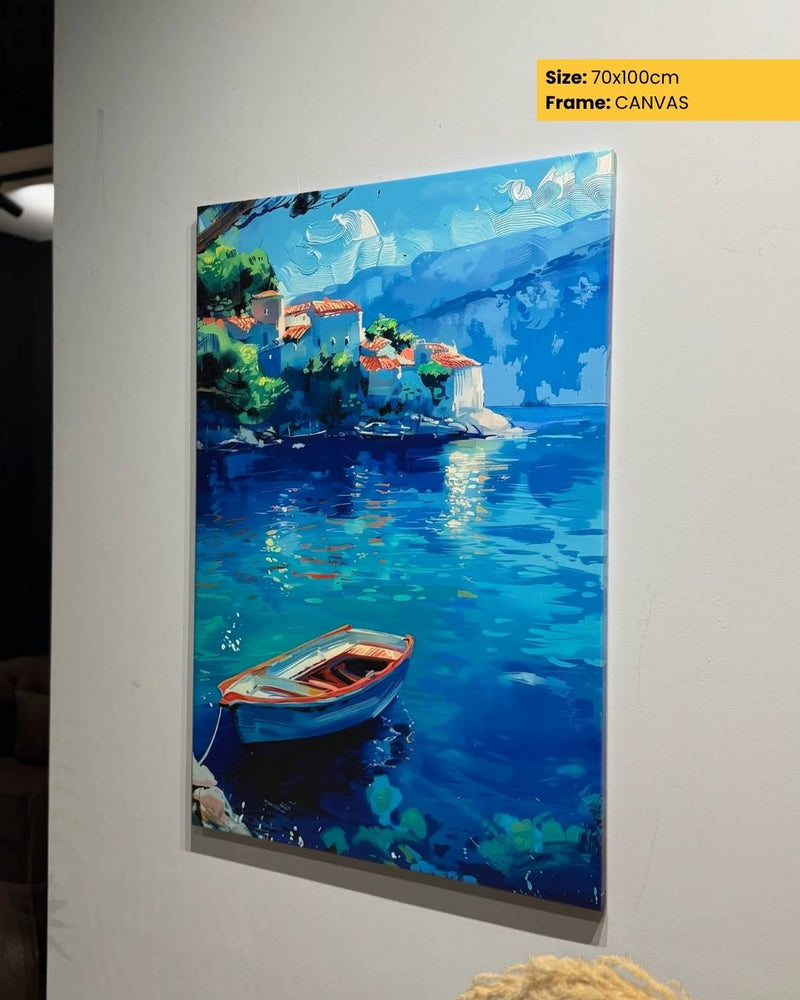 Painting of a coastal scene with a boat on a canvas, displayed against a white wall.