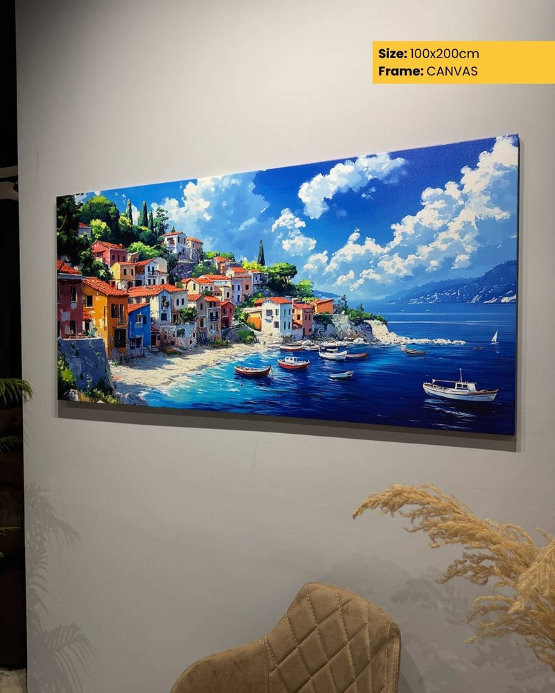 Canvas print of a coastal scene with houses and boats on a wall.