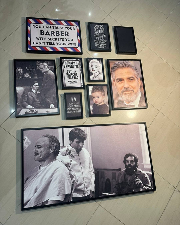 Collection of framed pictures and posters on a tiled wall