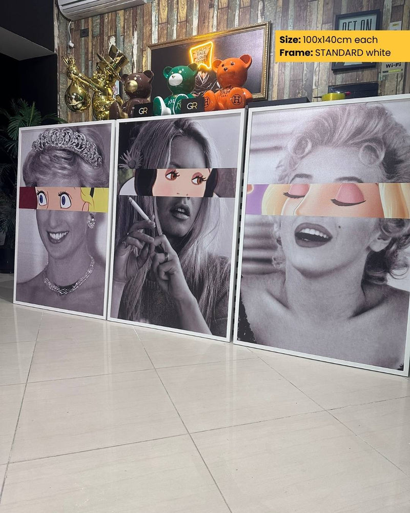 Three framed black and white portraits with colorful visors on a tiled floor.