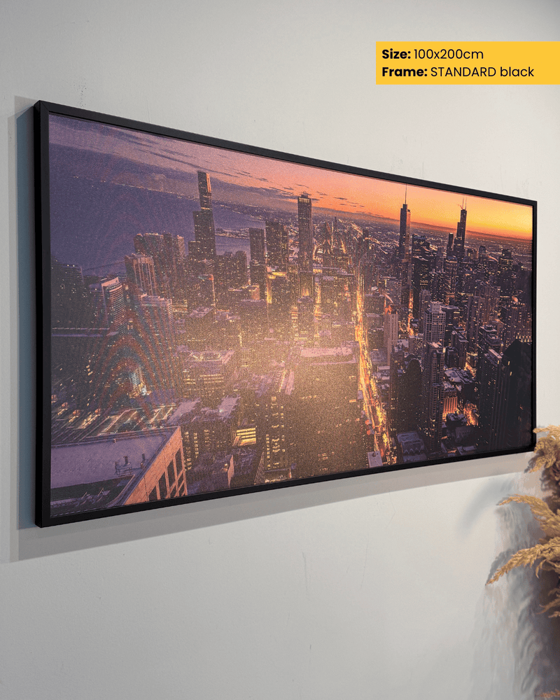 Framed cityscape artwork on a wall with dimensions and frame type displayed.