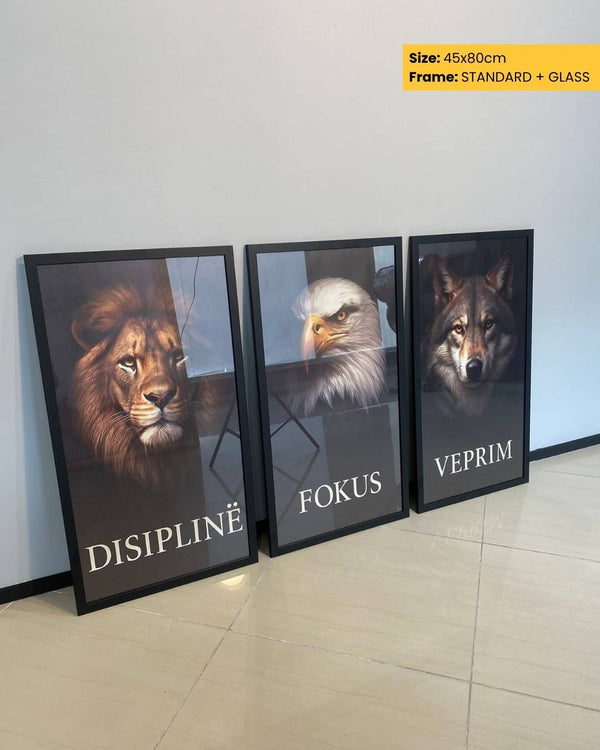 Three framed animal portraits on a wall with text underneath.