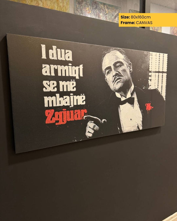 Canvas print with a famous quote and a portrait of a man in a suit on a dark background.