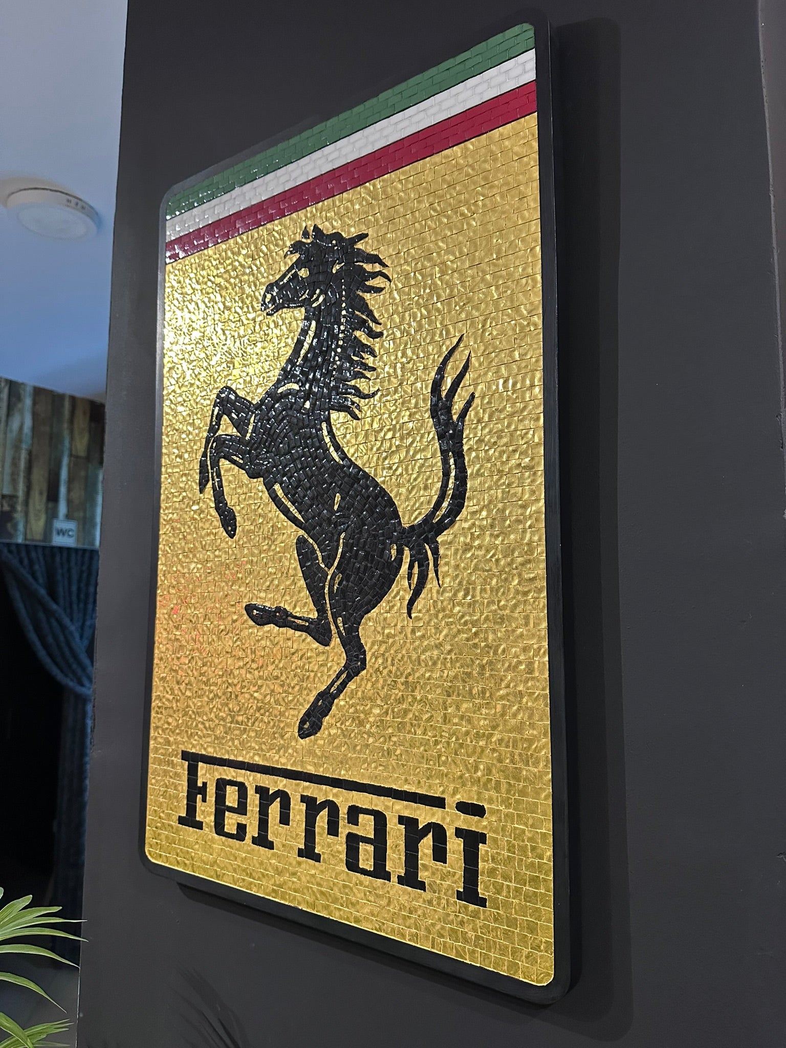 Ferrari mosaic wall art with Venetian gold stones and luxury black frame