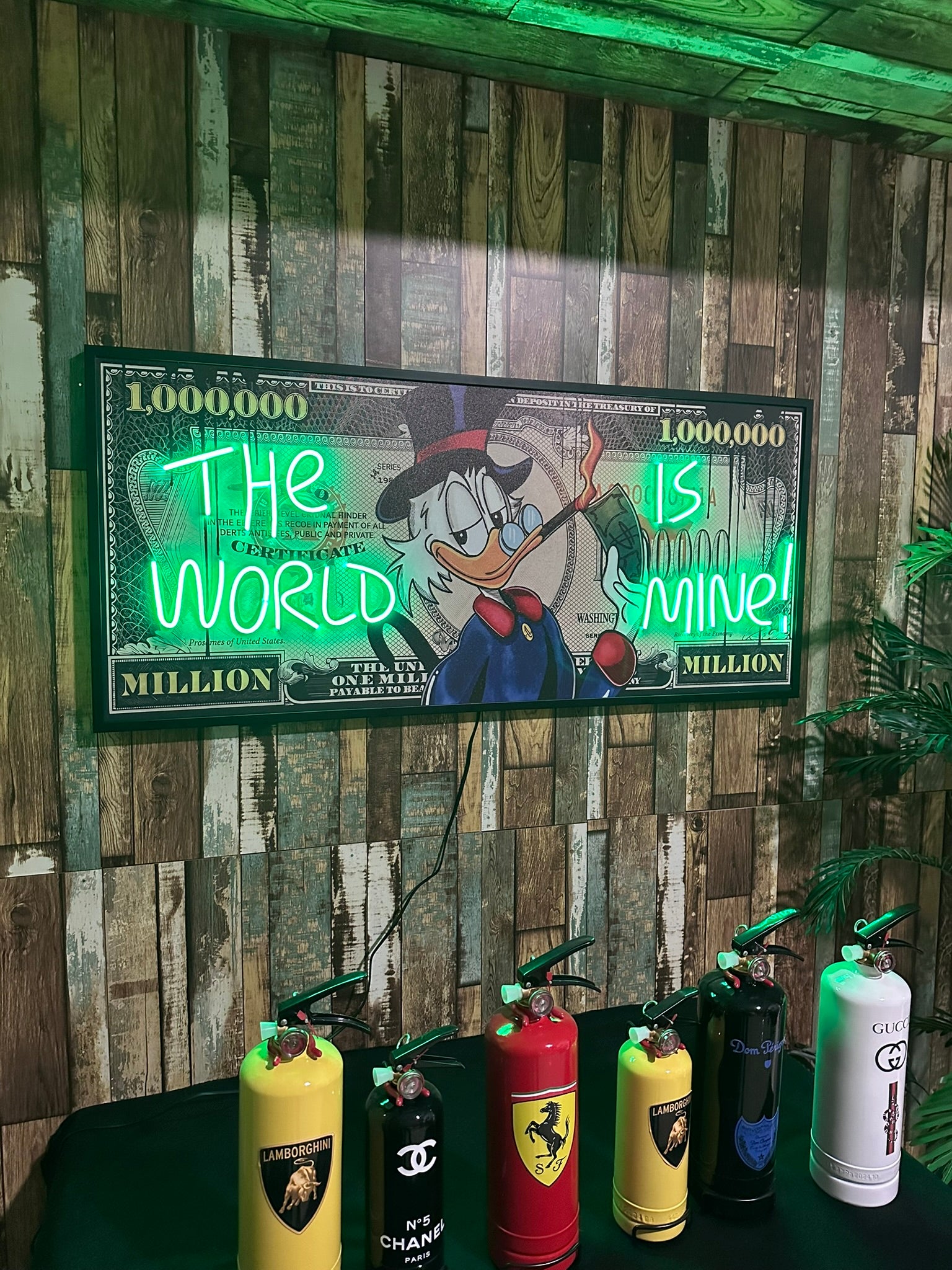 The World Is Mine LED Art with neon lights and millionaire dollar design