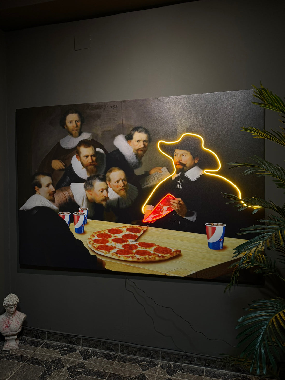 Mural of classical painting with modern elements like a pizza and neon lights, featuring a plant on the right.