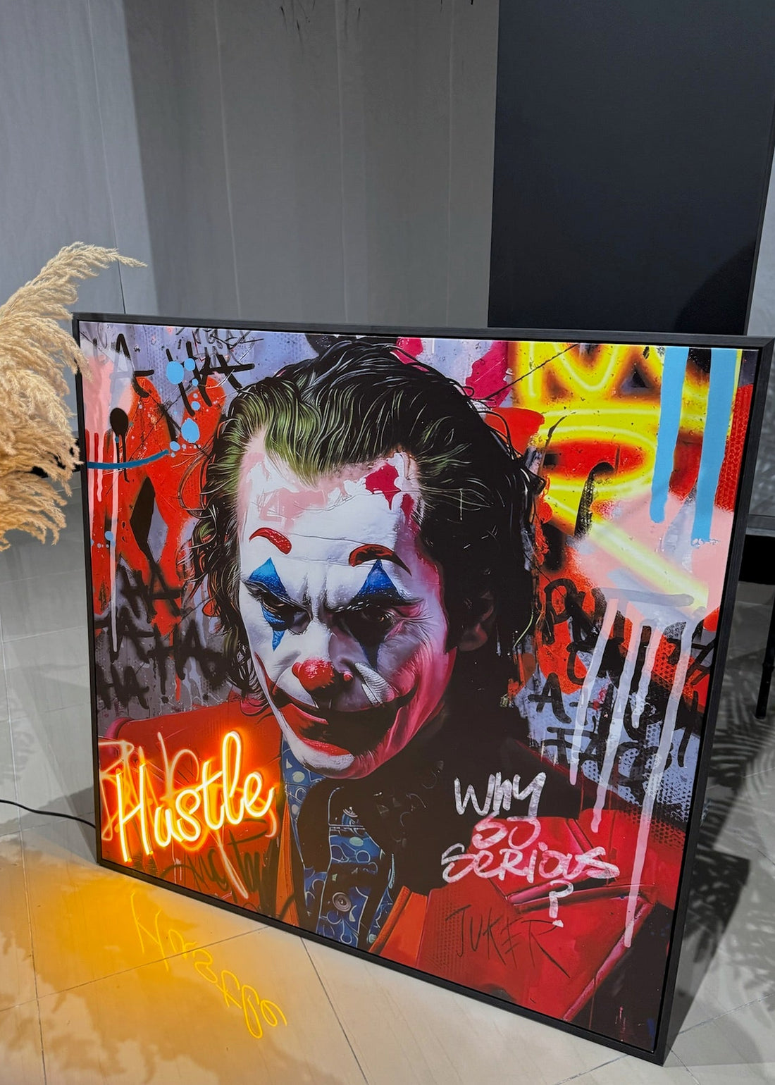 Framed artwork of a stylized character with colorful background and text.