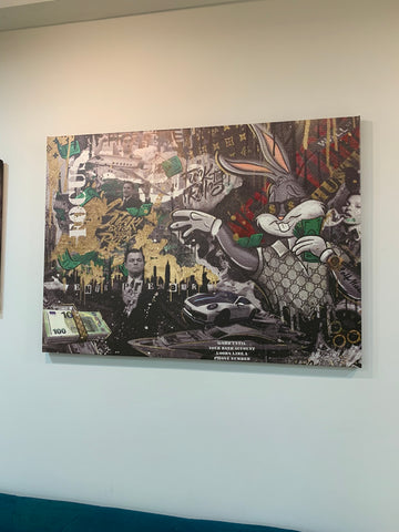 Collage-style artwork on a white wall