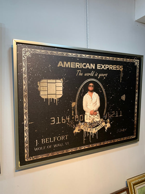 Framed artwork with American Express branding and a stylized credit card design.