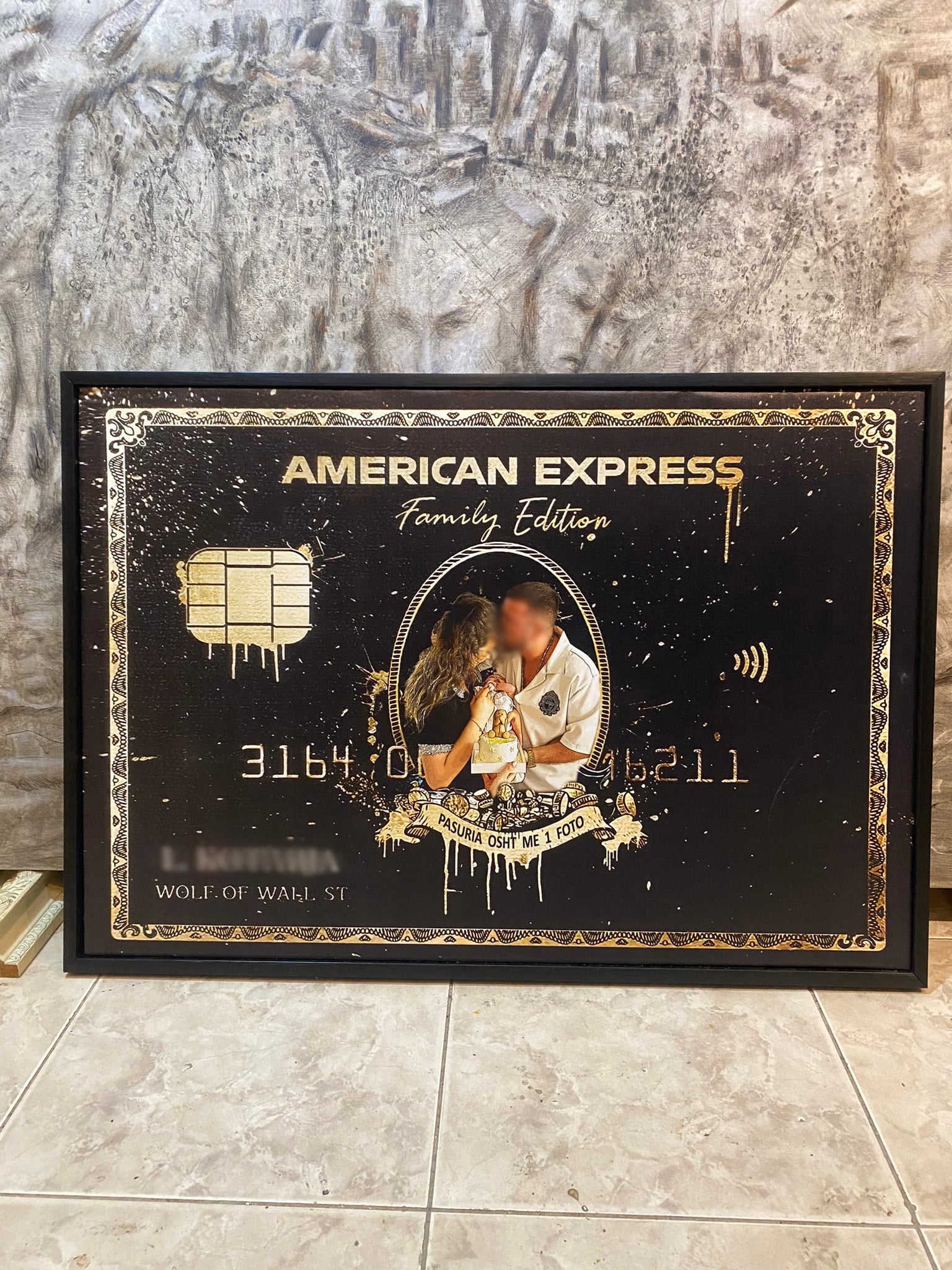 American Express card design with a couple on a textured wall background
