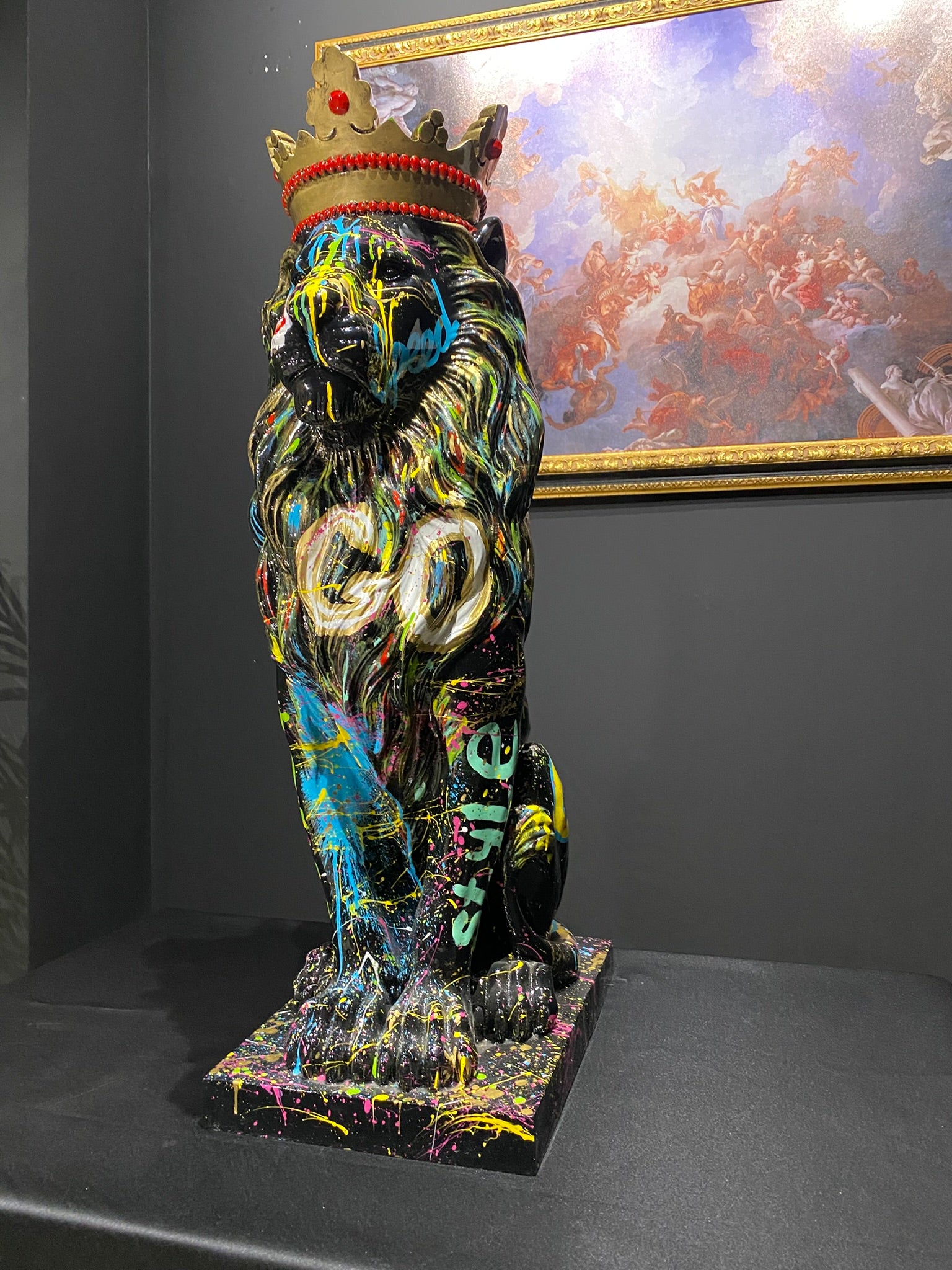 King Lion graffiti statue with crown and colorful luxury art design by GETRICH