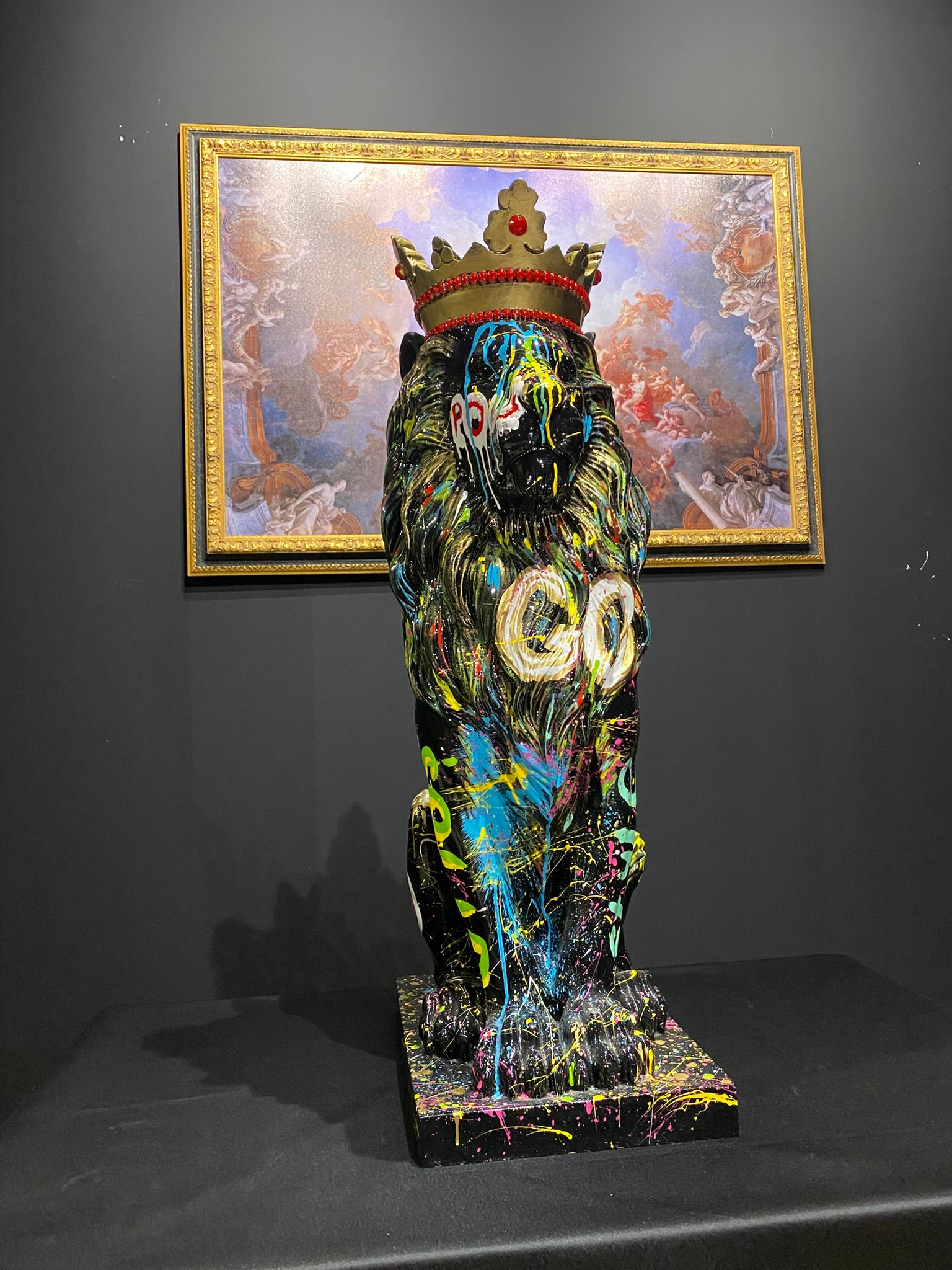 King Lion graffiti statue with crown and colorful luxury art design by GETRICH