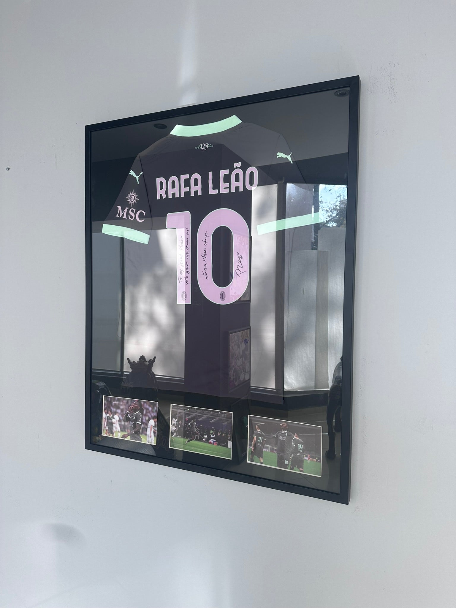 Custom football jersey frame with premium glass and player photos