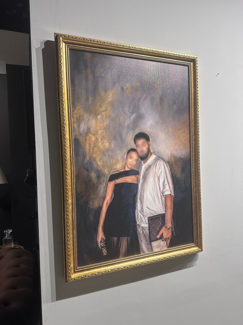Framed painting of a couple on a wall