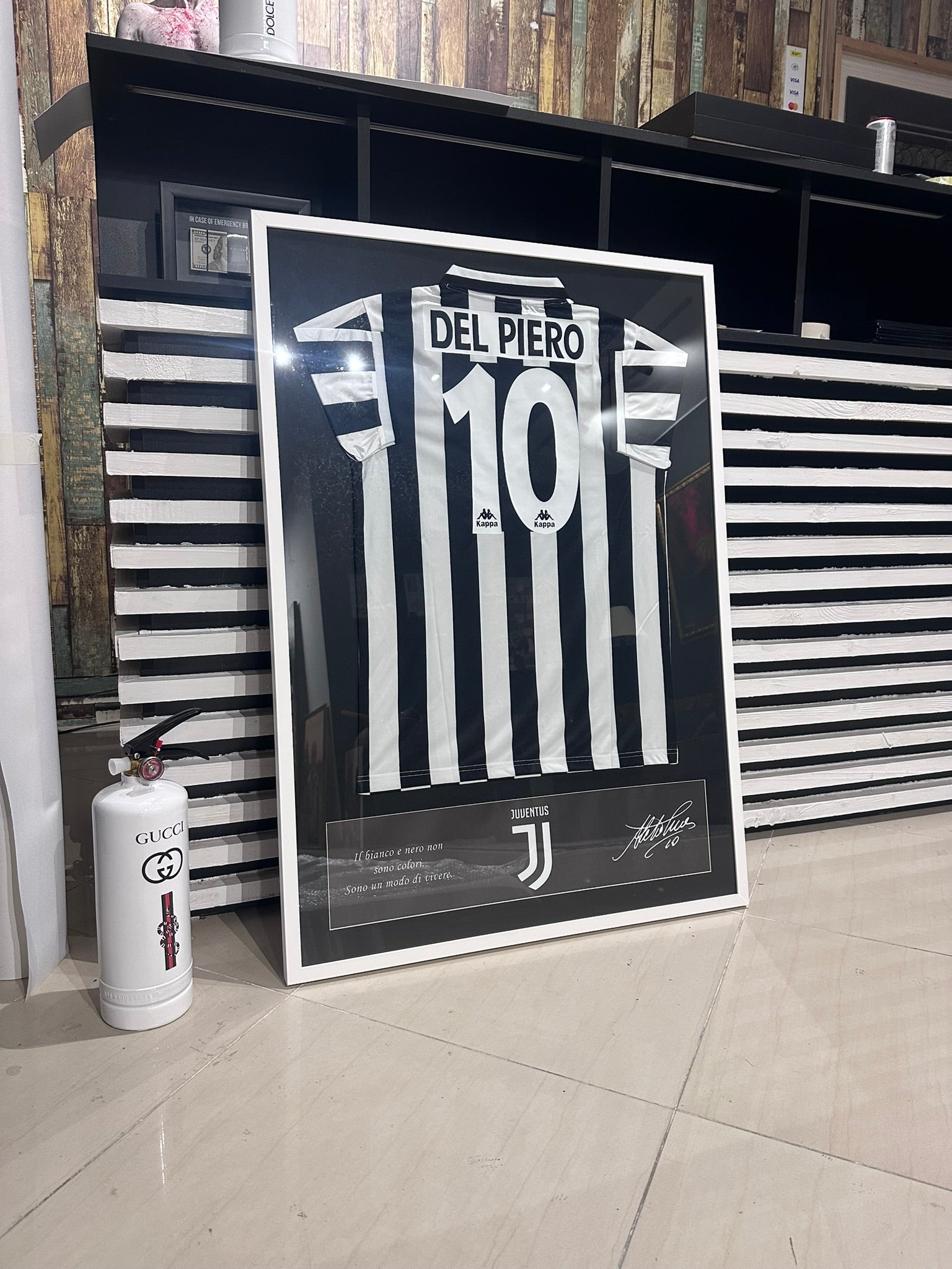 Custom football jersey frame with premium glass and player photos
