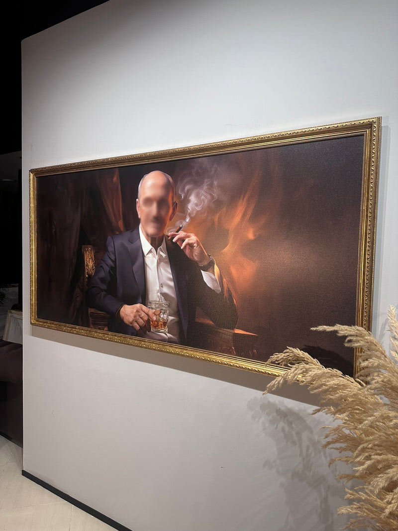 Framed artwork of a man smoking a cigarette and holding a glass against a dark background.
