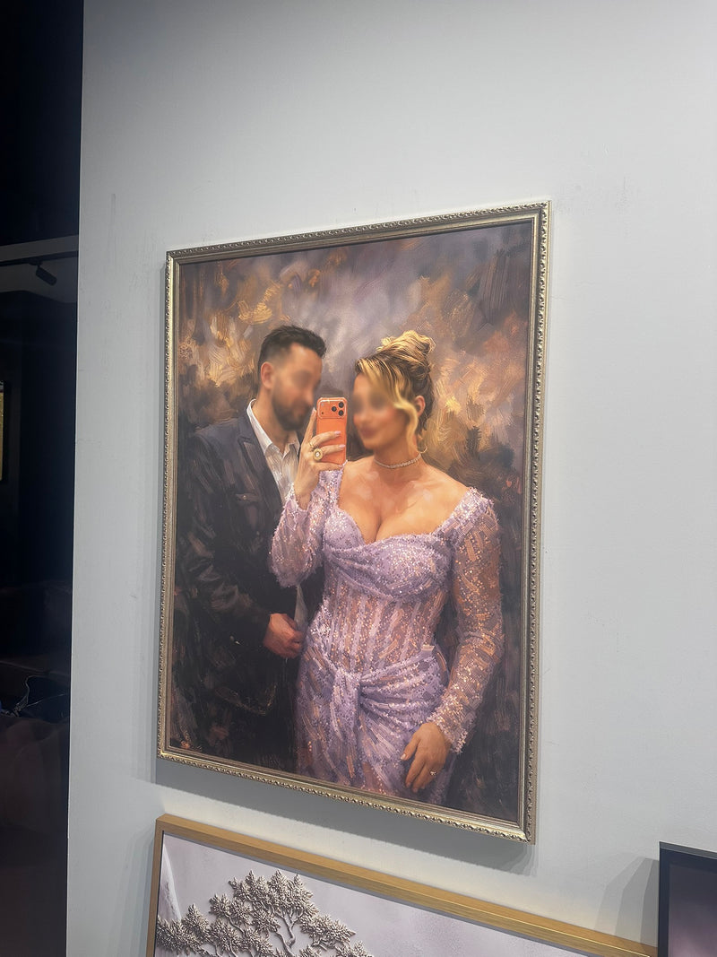 Framed portrait of a man and woman on a wall