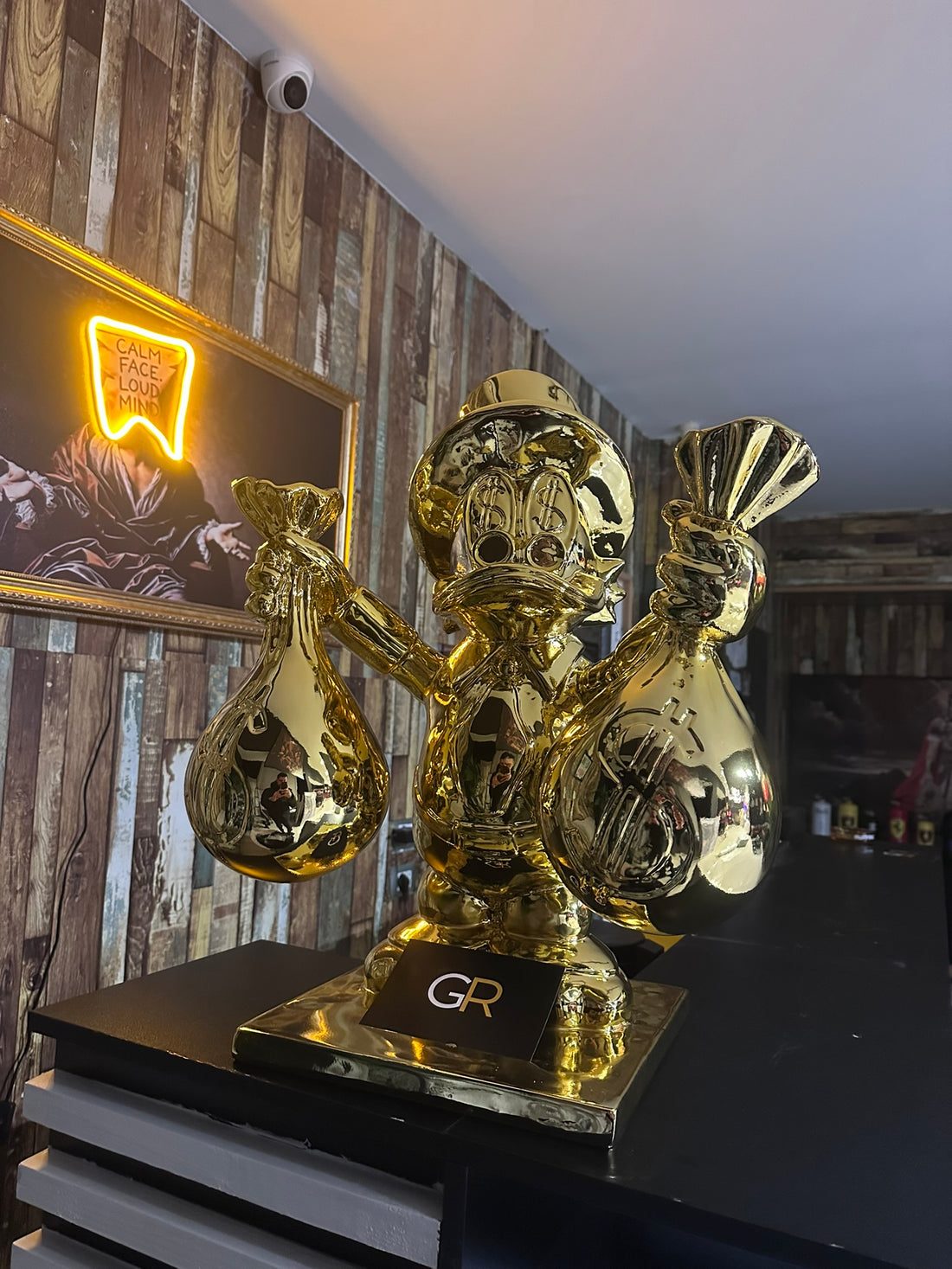 Gold rich duck statue holding money bags luxury decor by GETRICH