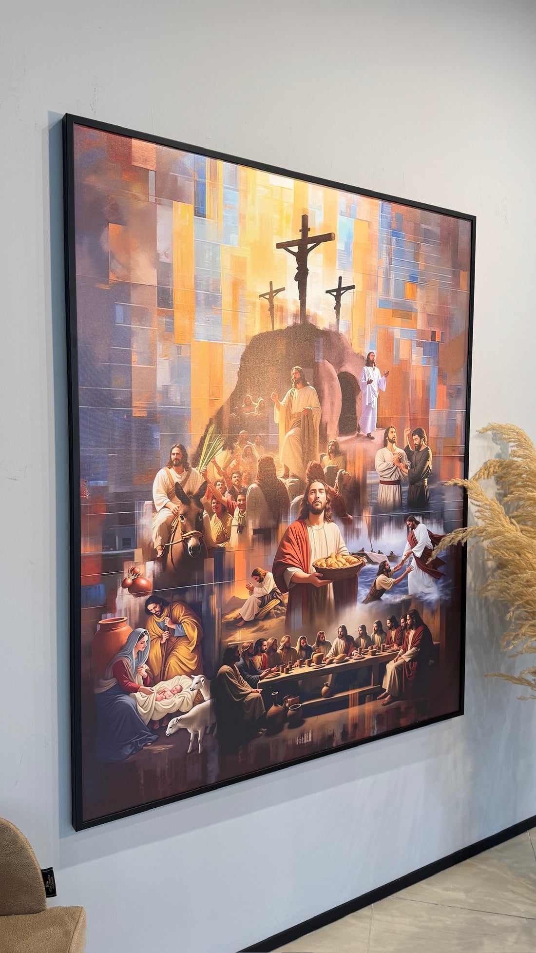 Framed artwork depicting religious scene with figures and crosses on a colorful background