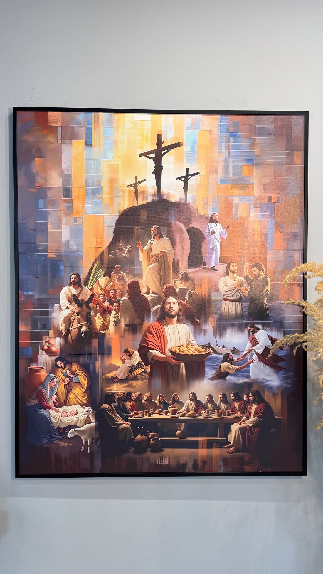 Framed artwork depicting religious scene with figures and crosses on a colorful background